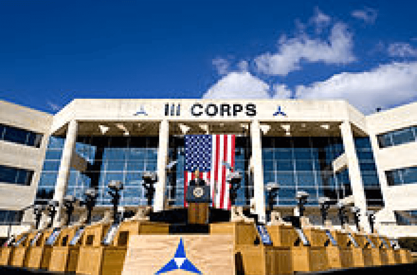 President Obama speaking in front of the 3rd Armored Corps headquarters.
