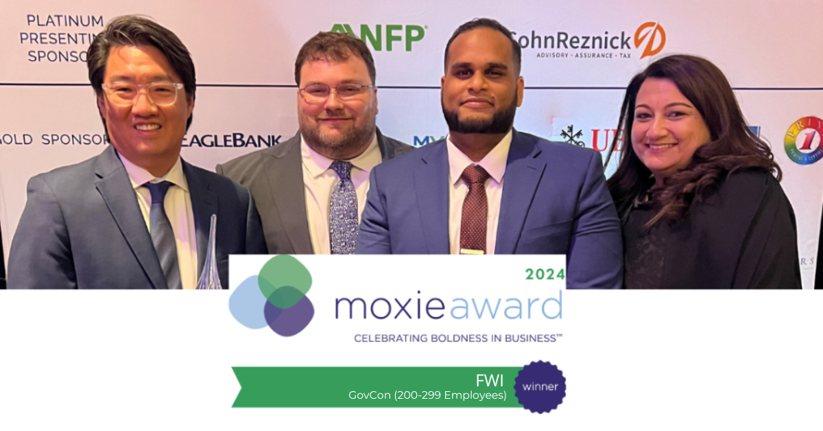 Mitchell Cho, Marc Fain, Subhaga Weerasinghe, and Susan Parr celebrating the Moxy Award win